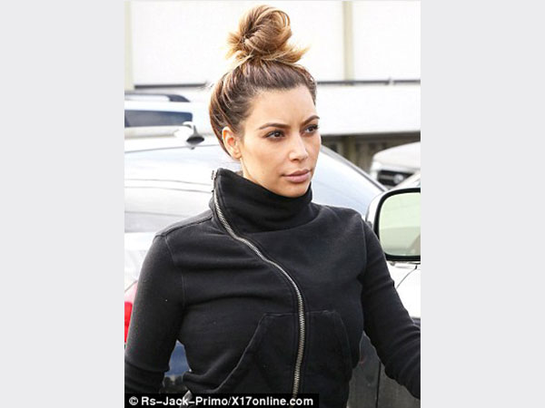 صور .. كيم كارداشيان في إطلالة رياضية مثيرة بعد فقدان الوزن .. وتسريحة شعر جديدة لعيد الميلاد