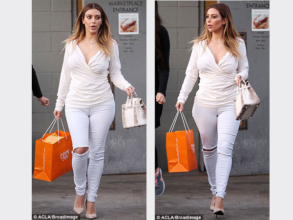 كيم كارداشيان ترد علي منتقدي جسدها الفوتوشوب بهذه الإطلالة.. صور