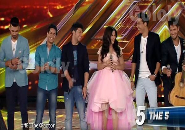 بالصور.. فستان دنيا سمير غانم يغطي مسرح إكس فاكتور بالكامل 3 20150614 110722 9665